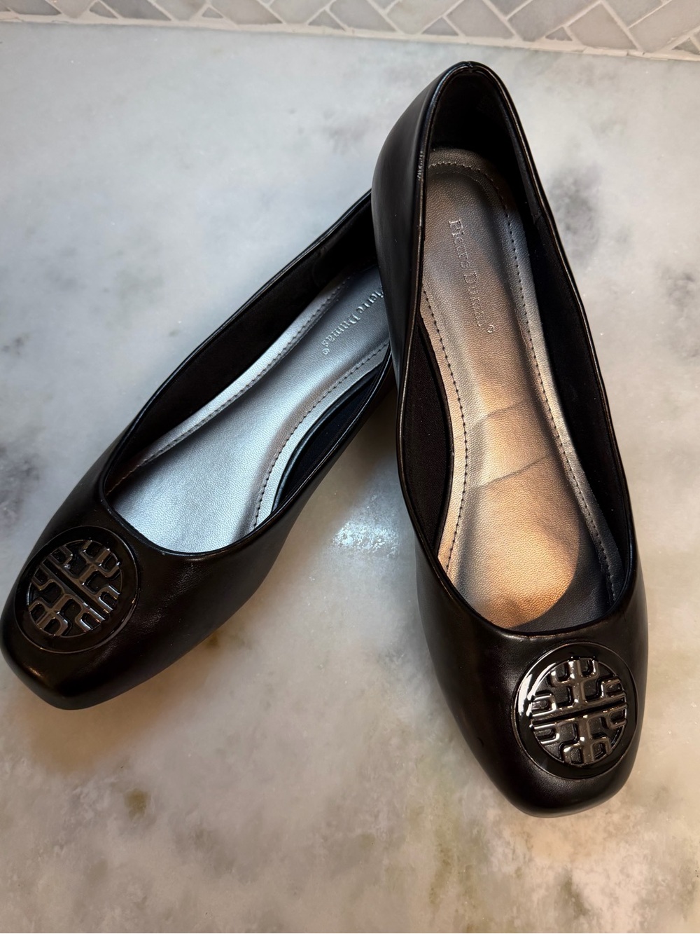 Black Women's Flats with Metallic Emblem 10M